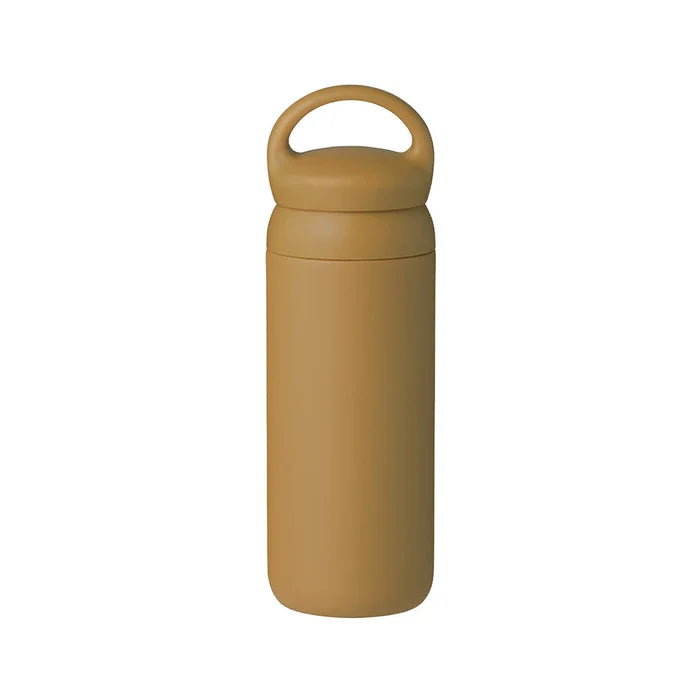 A yellow stainless steel tumbler with a rounded handle and a cap, against a white background.