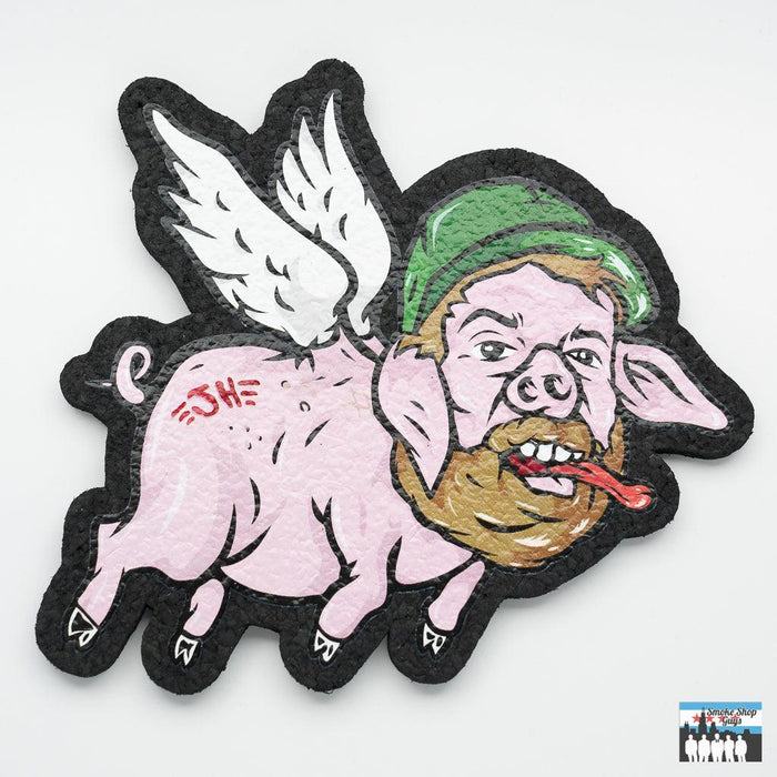 Joel Halen Flying Pig Moodmat – Eco-Friendly Dab Rig Mat (8"): Protect Your Surface, Upcycled Neoprene, Prevents Heat Damage, Spillage, Artistic Appeal, Whimsical Flying Pig Design, Unique Aesthetic, Eco-Friendly Material, Sustainability, Environmentally Conscious, Perfect Fit, 8 Inches, Accommodates Rigs, Dab Tools, Effortlessly, Versatile Use, Ideal for Dabbing Sessions, Decorative Functional Piece.
