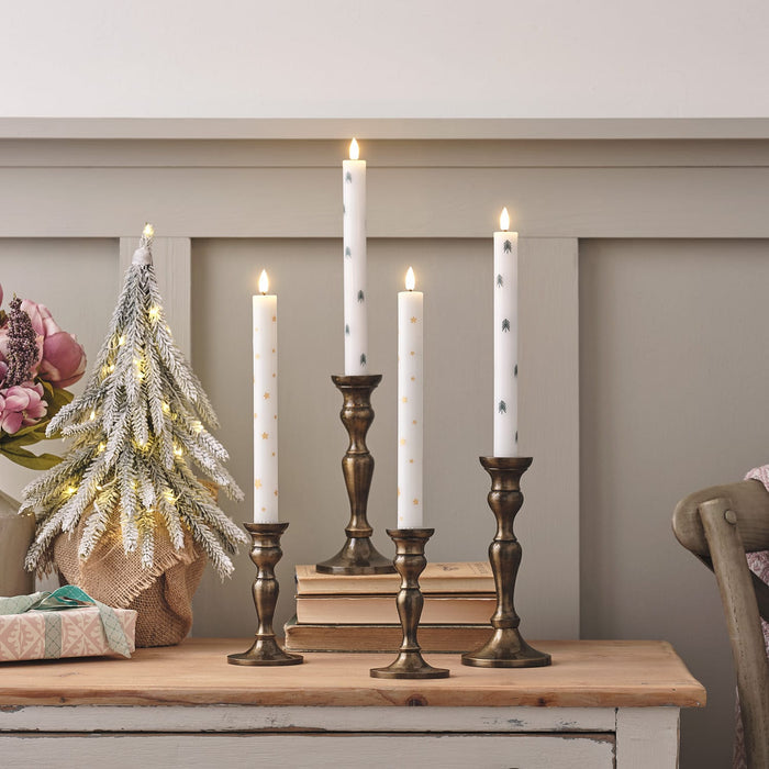 CA24043-Setof4ChristmasTreeandStarDecorationTruGlowLEDTaperCandles_98f69c09-9fa6-4b99-abe2-223b94254583.jpg