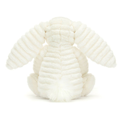 Plush bunny toy with soft ribbed fur pattern, viewed from the back