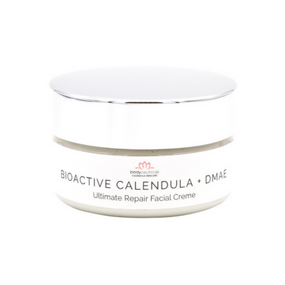 Front of calendula facial cream jar. Metal lid with white label.