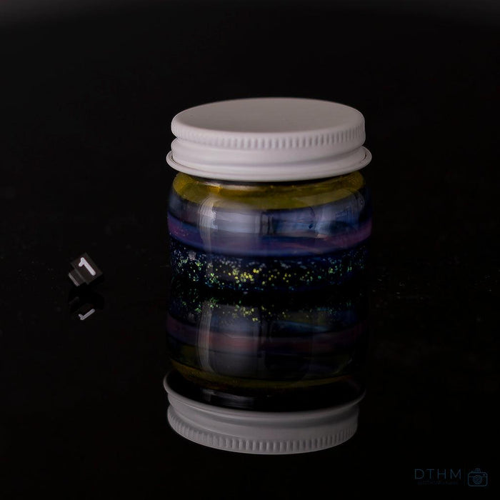Freeek Glass Encalmo Jars: Handcrafted storage, unique encalmo designs, secure storage, assorted colors, durable glass