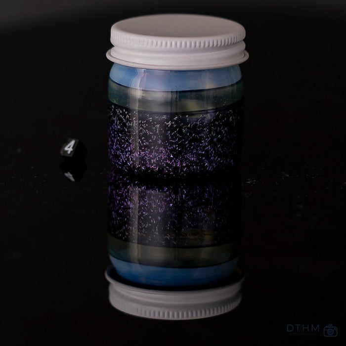 Freeek Art Storage Jars: Encalmo designs, handcrafted glass, secure storage, assorted colors, functional and decorative