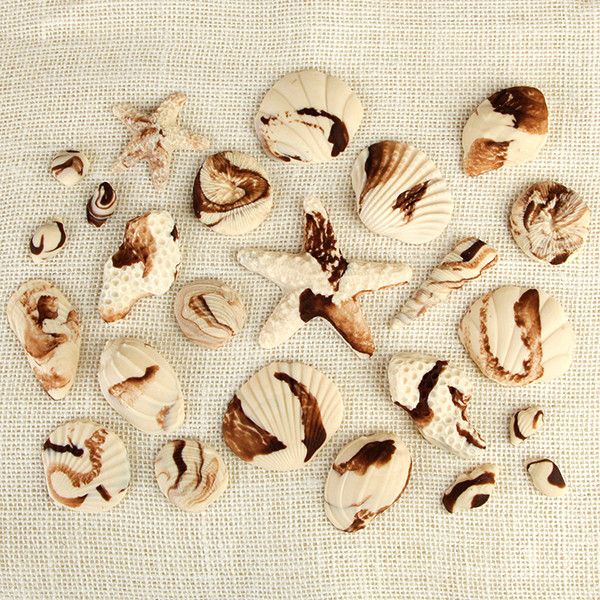 These fun edible fondant Marble Chocolate Sea Shells are perfect additions for any “Under the Sea” themed cakes.