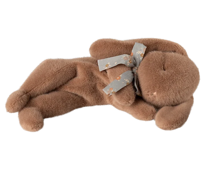 Maileg Small Sleeping Plush Bunny in Soft Brown on a white background — a velvety-soft warm brown stuffed bunny lying flat with a peaceful closed-eye expression and a delicate blue floral ribbon bow