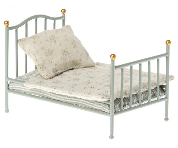 Maileg Vintage Single Bed in Mint — miniature mint metal bed frame with gold ball finials, dressed with a floral cotton duvet, striped mattress, and a soft floral pillow, on a white background